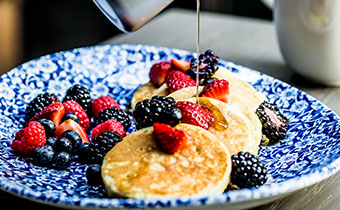 pancakes with fruit on a table